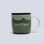 green coffee mug - فنجان قهوة