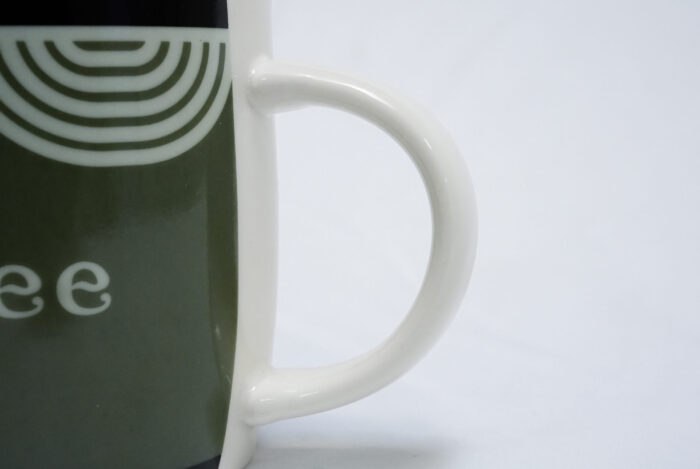 green coffee mug - فنجان قهوة