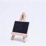 small black wooden board with stand - لوحة خشبية سوداء صغيرة مع حامل